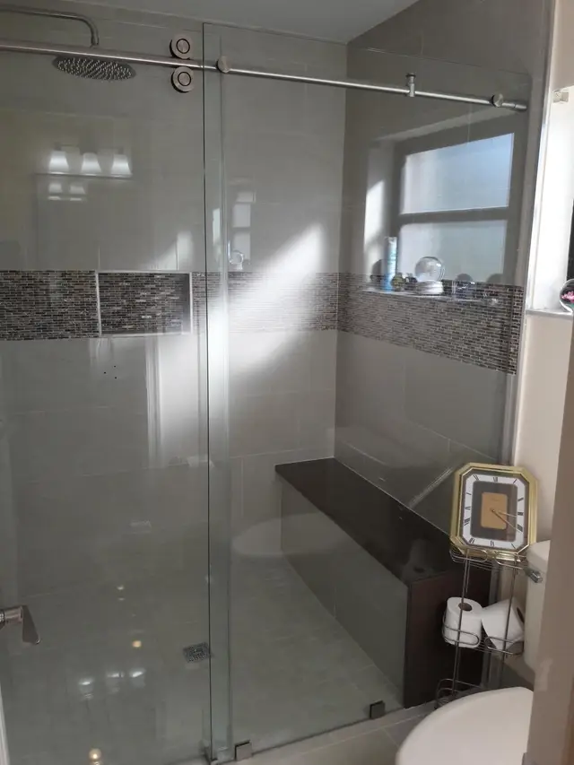 Glass mosaic tile walk-in shower