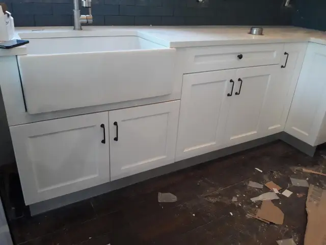 White kitchen with farmhouse apron sink
