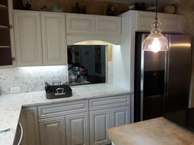 Traditional cream kitchen with archway pass-through